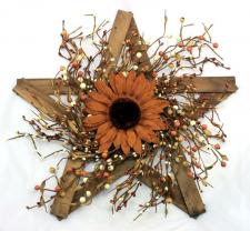 MIXED BERRY WREATH W/LEAVES ON WOODEN STAR WITH LARGE SUNFLO