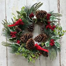 RED BERRY WREATH WITH RED CARDINALS, PINE CONES & HOLLIES ON